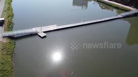 Drone footage of floating walkway on the Pinheiros River in São Paulo, Brazil