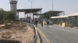 Palestinian protesters argue with Israeli forces following a protest aginst settlements in the village of Nabi Samuel