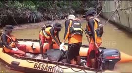 Emergency services retrieve bodies of four indigenous Papuans mutilated and killed by Indonesian soldiers