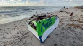 Burnt-out makeshift migrant boat found abandoned on Delray Beach in Florida