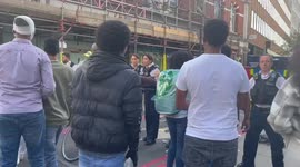 Tension as police block people attempting to join an ongoing protest outside the Eritrean Embassy in London