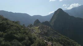 Quick drone flight panning Machu Picchu Peru