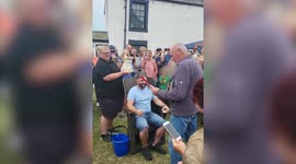 Man who became sole landlord and king of a tiny island coronated by having beer poured over him