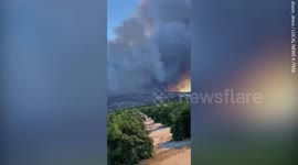 Raging wildfire in California destroys multiple structures as heatwave intensifies