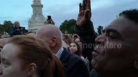 An entitled man trys to blag his way to the front of the people outside Buckingham Palace by claiming he is her Grandson