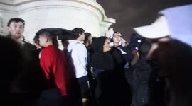People party late into the night outside Buckingham Palace on the day the Queen died