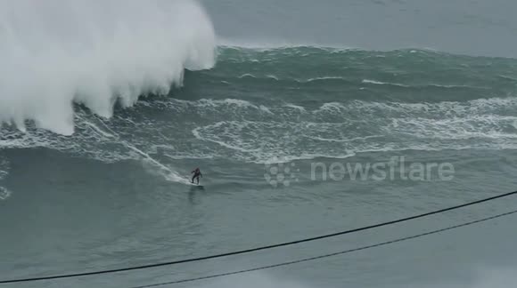 British surfer Andrew Cotton rides MONSTER wave in Portugal
