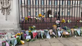 Buckingham Palace gates covered in flowers after Queen’s death