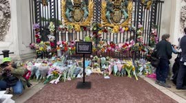 Buckingham Palace gates covered in flowers after Queen’s death