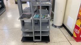 Empty news rack at WH Smith Victoria station after Queen’s death