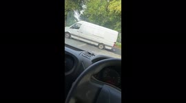 Idiot delivery driver blocks road!