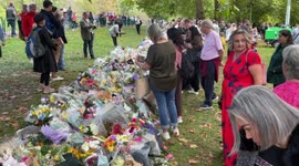 Queens floral tribute green park- people are very sad laying flowers and reading messages for the queen