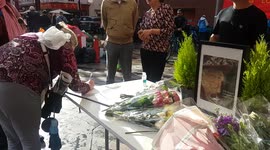 The public sign a book of condolence in London's Chinatown following Queen's death