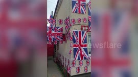Royal fan covers house with more than 100 Union Jack flags to mark Queen's death
