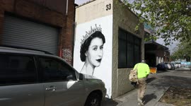 Graffiti on mural to the Queen is removed, Sydney, Australia