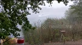 Heavy rain while thunderstorm Hits zur Garden suddenly in the middle of the day