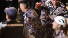 Watch the moment a body was pulled out from under the rubble following the collapse of a building in Al-Weibdeh in Amman.