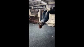 American football coach attempts to hype up his team with backflip - but fails to land it