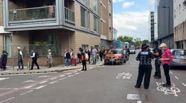 People Lining up to see the queen, goes past Tower Bridge and expands into the area of Bermondsey, this at the time of filiming was the end of the line at Chambers Street