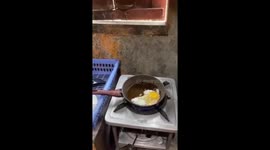 Floodwater strikes Indonesian home while cooking breakfast