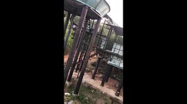 rescue a leopard who  lost  his way  and struck in the water filter in sri lanka temple