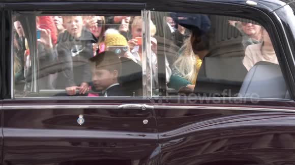 HM Queen's Funeral cortege passes along Whitehall in London with royals walking behind