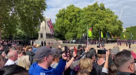 Mourners sing God Save The King along with Queen’s funeral, on Horse Guards Parade