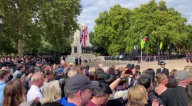 Mourners clap after singing God Save The King on Horse Guards Parade during Queen’s Funeral
