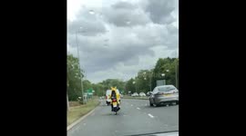 Pikachu on a moped, pikachu rides a moped!!?? Not what I expected to see on my way home!