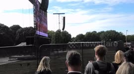 Crowd at Hyde Park applaud to 'God Save The Queen' theme during The Queen's funeral