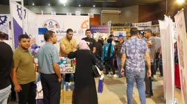 Palestinians attend the opening of the National Products Bazaar in Gaza City.