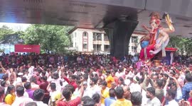 Crowds gather to bid adieu to big Sky high Ganesha Idols in Mumbai, India