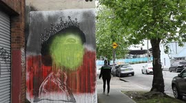 Aboriginal flag painted over Queen Elizabeth II mural in Sydney
