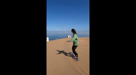 Fun Sandboard Classes in the dunes of Iquique Chile, by women who first practice this sport, a nice place to learn with SoulSandboardiChique