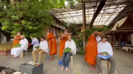 American students get their heads shaved in India as they 'become' Buddhist monks for short period of time