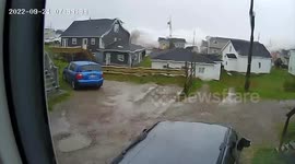 Tsunami-Like waves knock down houses in Port aux Basques, Newfoundland as Fiona makes landfall