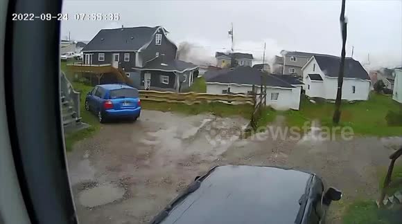 Tsunami-Like waves knock down houses in Port aux Basques, Newfoundland as Fiona makes landfall