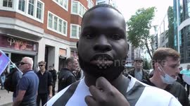 Young man gives and interview during DFLA 'Anti-illegal immigration' rally, 