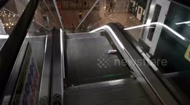 Tin Can Vs Escalator is a video showing a tin can on an escalator that is continuously trying to go down the steps. but due to the escalator going in the wrong direction the tin can keeps coming back up.