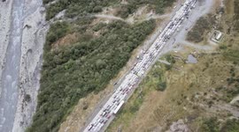 Drone footage reveals huge queue of Russian citizens at border with Georgia