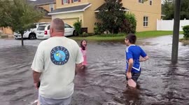 Hurricane Ian: Orlando family in good spirits despite wading through thigh-high water