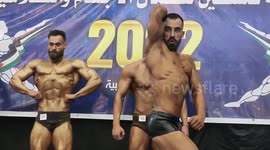 Palestinian contestants take part in a local bodybuilding championship
