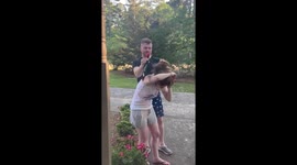 Baby woodpecker gets its talons into woman's hair and clings to her head