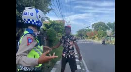 Allegedly he didn't want to be ticketed by a man in Indonesia who beat the traffic police