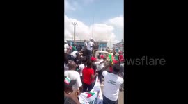 People sing at the rally supporting Peter Obi in Asaba, Nigeria