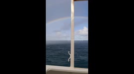 A rainbow formation near the ship while on voyage