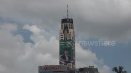 Flags lowered on buildings around Bangkok as nations mounts nursery massacre victims