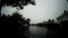 Torrential rain in Harrogate England caused for dangerous driving conditions and excessive water on the roads