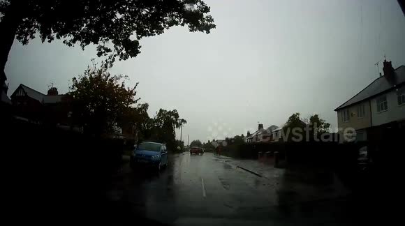Torrential rain in Harrogate England caused for dangerous driving conditions and excessive water on the roads