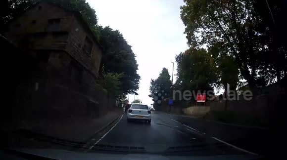 Dashcam footage showing a dangerous impatient driver of a white VW Golf near Harewood North Yorkshire